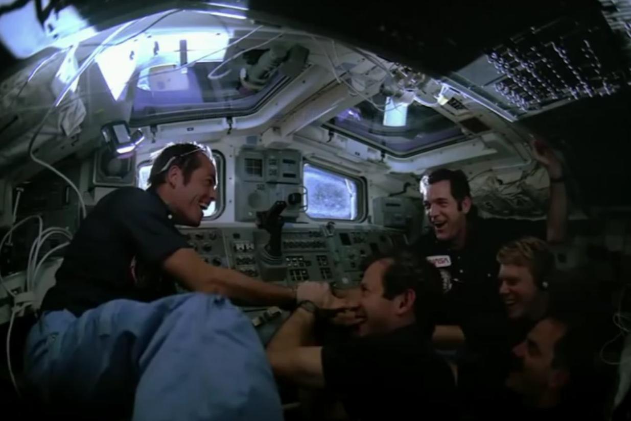 Job well done. STS-41C crew celebrate capture of Solar Max
